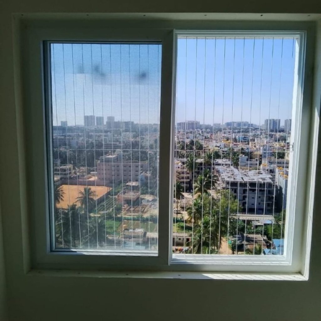 Large window invisible grill — villa project Coimbatore